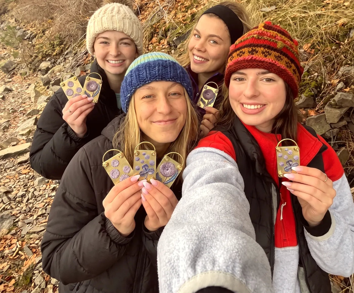 Friends on a trail with their presses